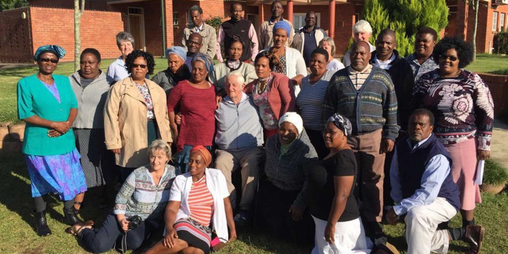 The staff of ACAT KZN in front of their headquarters in Howick, KwaZulu-Natal, South Africa.