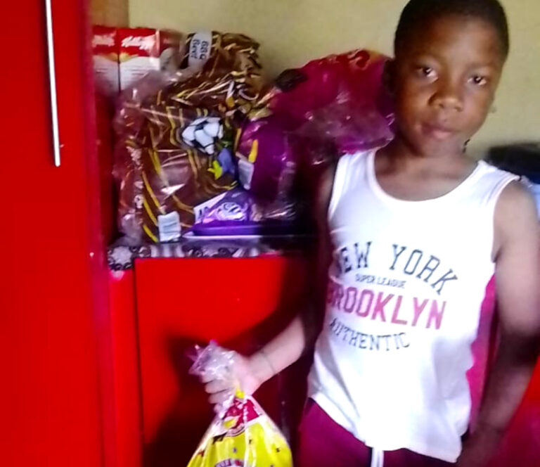 Thandolwethu Tenza has a small business selling chips and sweets.